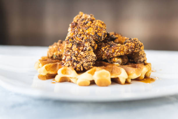 istock Breaded fried chicken with cereal and waffles with barbecue sauce 1331674593
