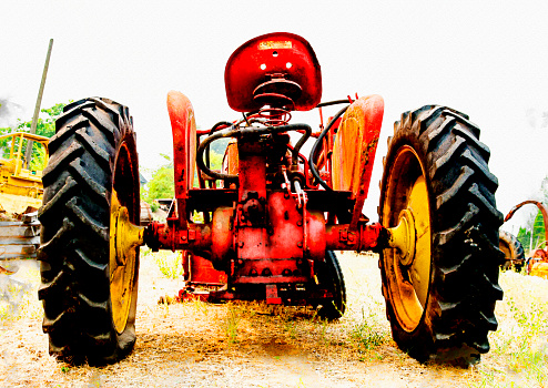 rear view of old red tractor