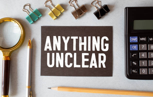 istock Anything unclear. Time to adapt. Word on white sticker with yellow background 1331687452