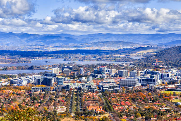 ACT Mt CBD day clouds Scenic elevated view of Canberra city CBD on shores of Lake Burley Griffin - sunny day. canberra photos stock pictures, royalty-free photos & images
