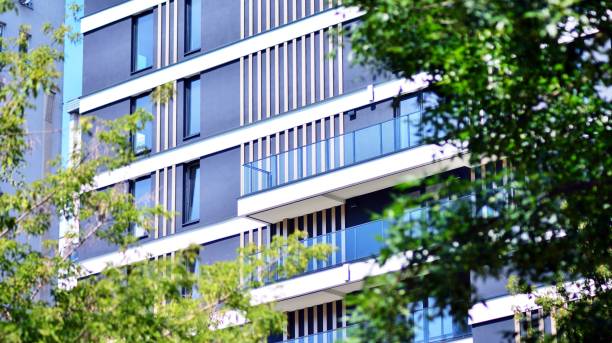 istock Eco architecture. Green tree and apartment building. 1331693451