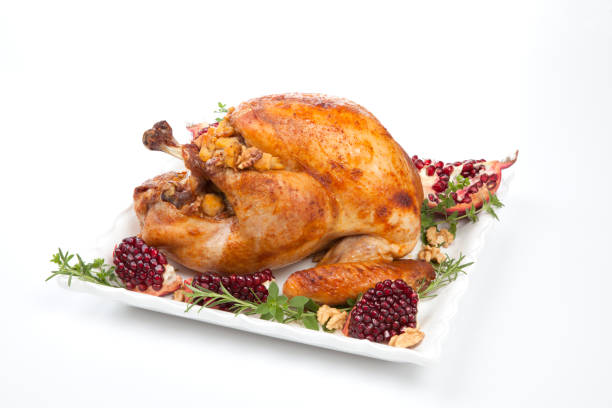 istock Pomegranate Glazed Roasted Turkey on White 1331700115
