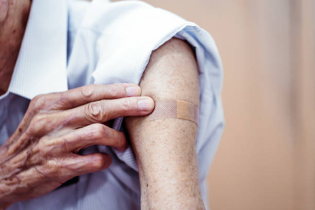 istock Senior person  getting vaccinated in hospital 1331706582
