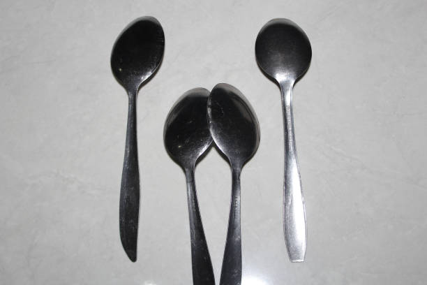istock Four spoons in two pairs 1331712724