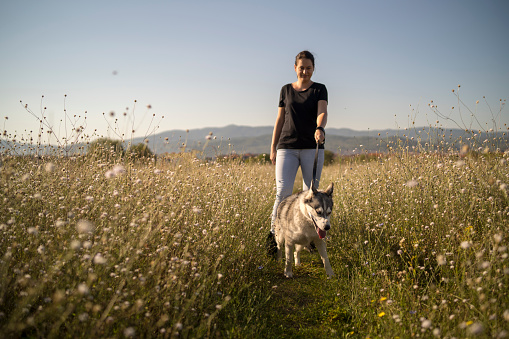 girl and her faithful Siberian husky