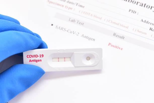 istock COVID-19 positive by antigen test kit 1331728809