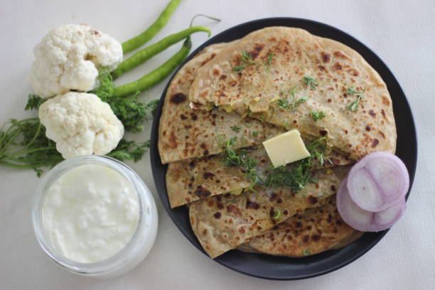 istock Gobi paratha or cauliflower paratha is a type of paratha or parantha or flatbread, that is stuffed with flavoured cauliflower and vegetables. 1331733936