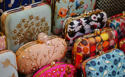 Close-up view of Indian woman hand made craft hand bag shop display