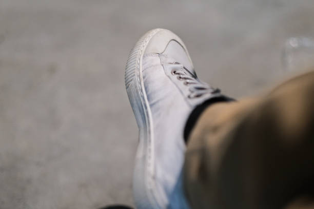 white shoe on feet. stock photo