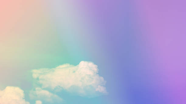 istock beauty sweet pastel soft blue with fluffy clouds on sky. multi color rainbow image. abstract fantasy growing light 1331737720