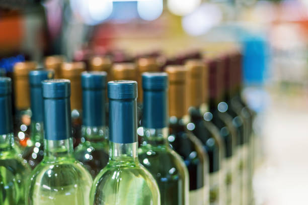 istock Assortment of wine bottles. Selective focus. 1331740207