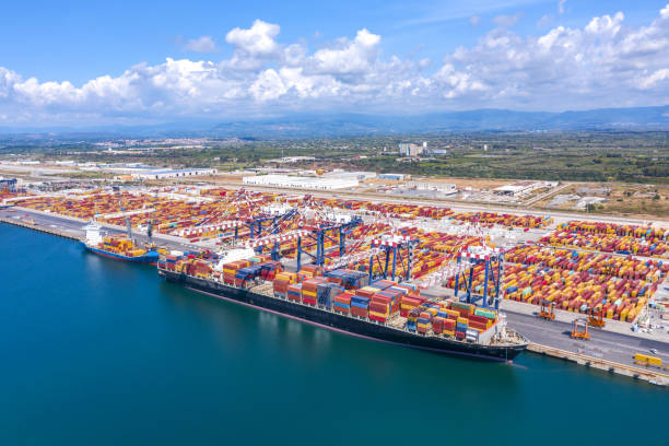 istock Huge area of conteiners. Boat filled with conteiners. Global import-export. 1331740814