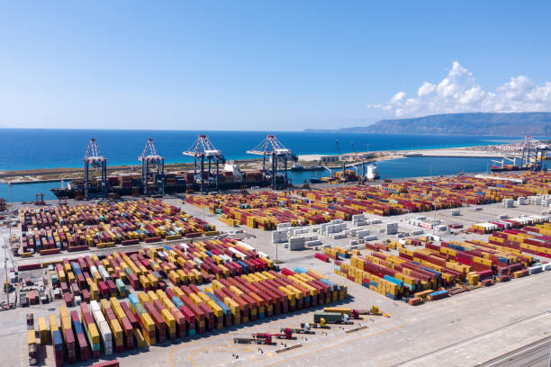 istock Huge area of conteiners. Boat filled with conteiners. Global import-export. 1331740825