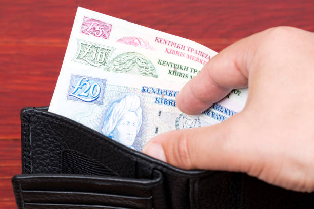 istock Old Cypriot pound in the black wallet 1331741788