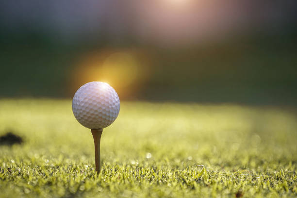 istock Golf ball on tee ready to play in a beautiful golf course 1331743360
