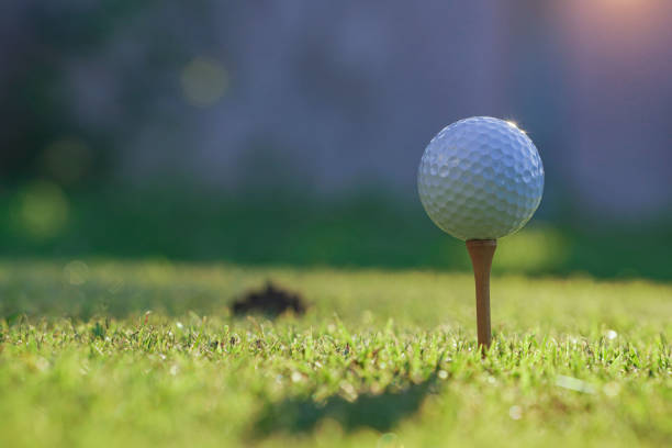 istock Golf ball on tee ready to play in a beautiful golf course 1331743365
