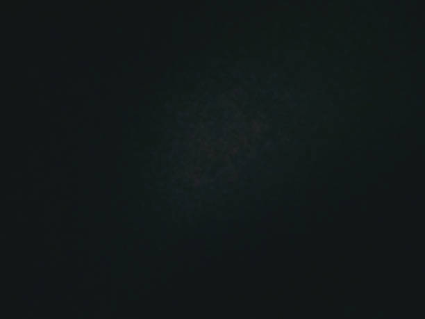 istock The dark black background image. Abstract background picture. Illuminated background image 1331743621