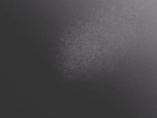 istock The dark grey background image. Abstract background picture. Illuminated background image 1331747444