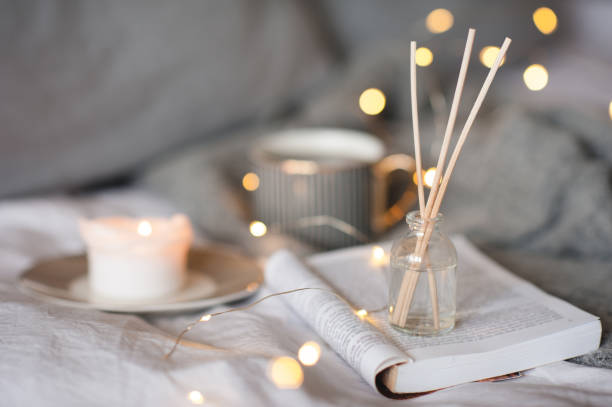 istock Liquid home perfume with candle in bed 1331747986