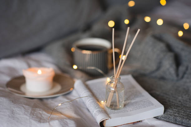 istock Liquid home perfume with candle in bed 1331747999