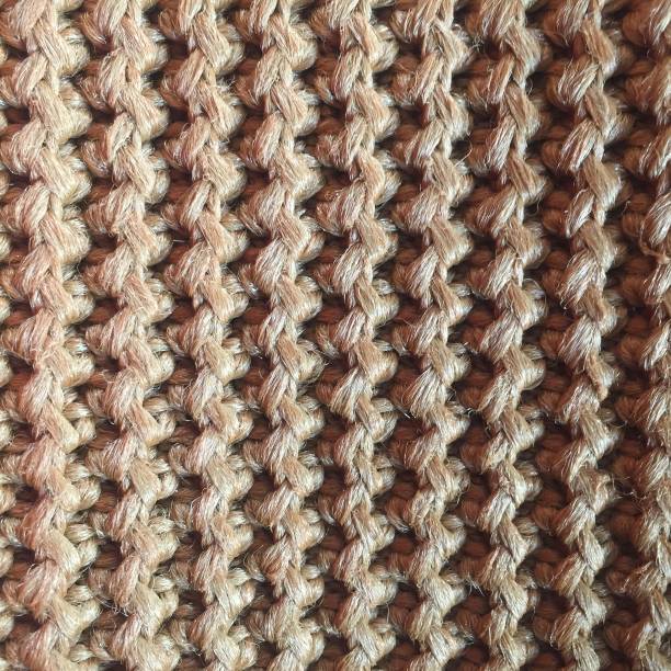 istock Brown hand knitted wool blanket with super thick yarn concept. 1331750768