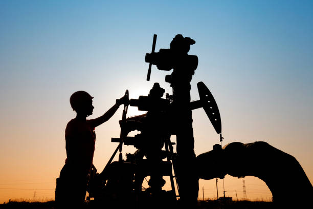 istock Oil drilling exploration, the oil workers are working 1331755357