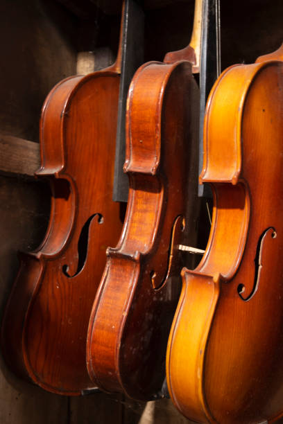 istock Close-up of violins are hanging 1331757672