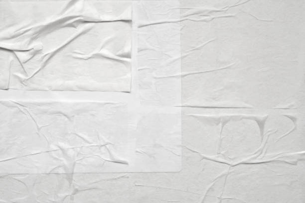 istock Blank white crumpled and creased paper poster texture 1331759260