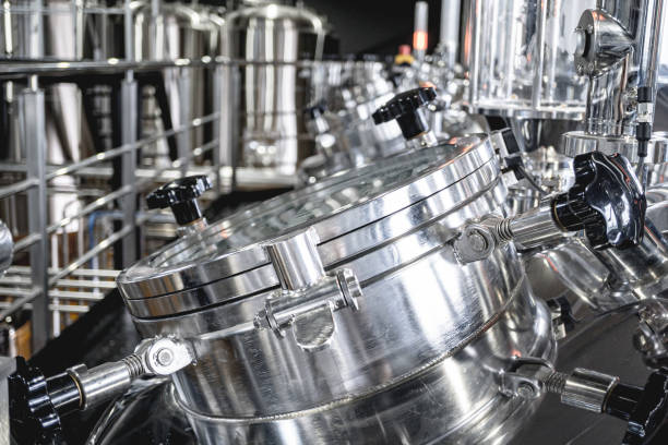 istock Craft beer brewing equipment in privat brewery 1331761356