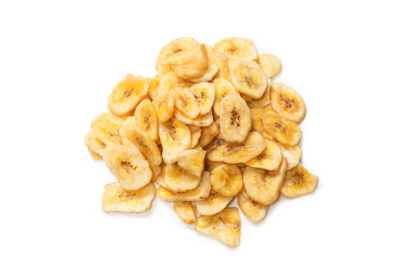 istock Banana chips isolated on a white background. Dehydrated banana. 1331762610