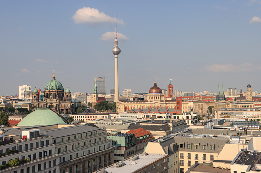 Aerial view of Berlin skyline panorama with Grosser Tiergarten public park on a sunny day with blue sky and clouds in summer, Germany.