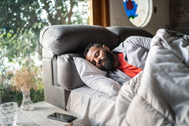 istock Mature man sleeping on the bed at home 1331766114