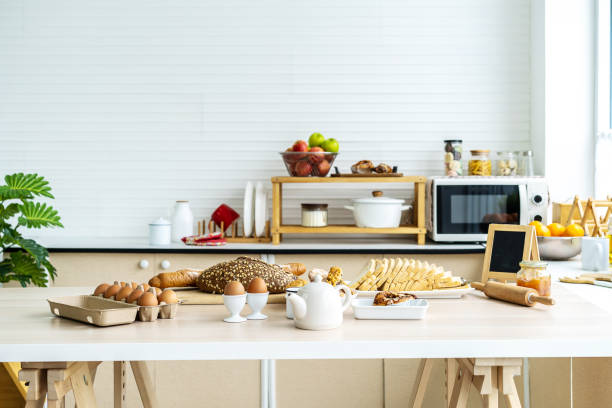 istock Sliced Toast Loaf White Bread, rustic bread, cut into pieces,  for Breakfast on Wooden Background, Served with Egg and Milk. Concept of food preparation, kitchen on background 1331771351
