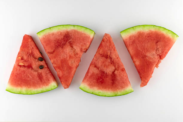 istock Watermelon slices on a white background. Flat lei. 1331776446