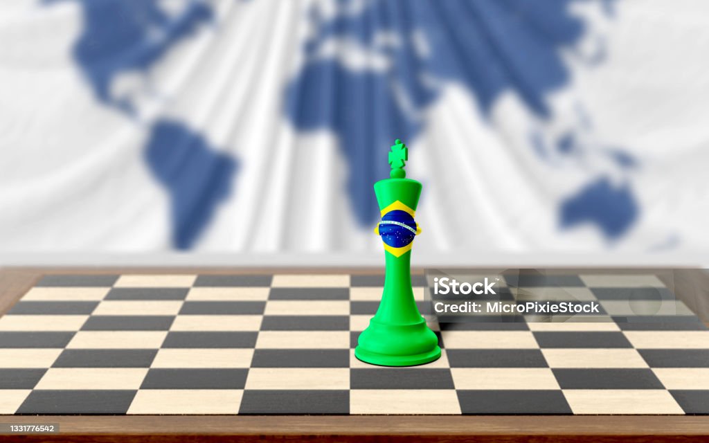 Foto de Rei Do Xadrez Brasileiro Coberto Com Bandeira Do País Em
