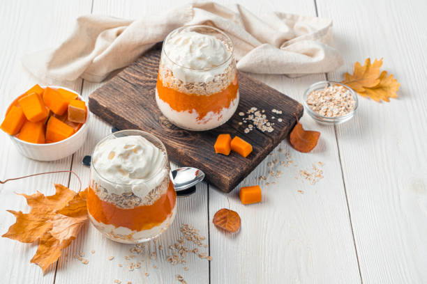 istock Pumpkin parfait with cream and cereals on a white background 1331777706
