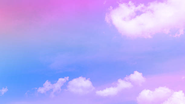 istock beauty sweet pastel soft purple with fluffy clouds on sky. multi color rainbow image. abstract fantasy growing light 1331782826