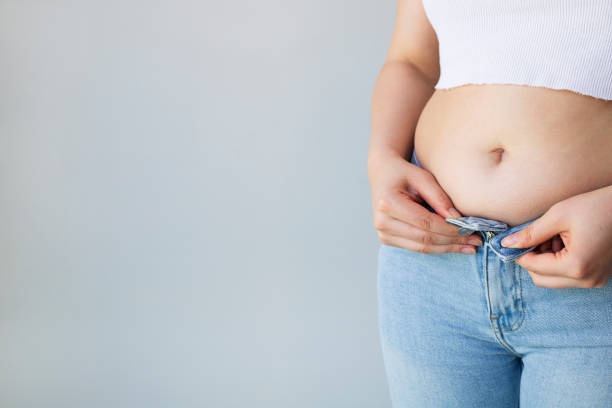 istock Overweight women wearing a jeans 1331783498