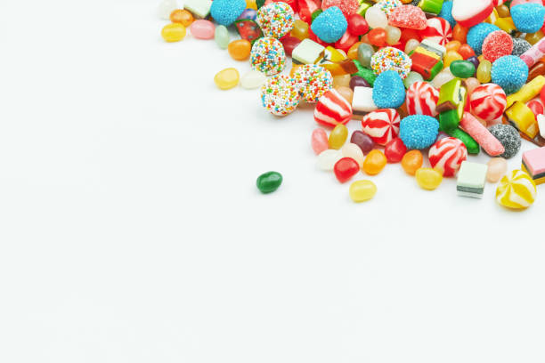 multi-colored gummy candies on a white background. festive frame backdrop. - gum drop copy space sweet food gelatin dessert imagens e fotografias de stock