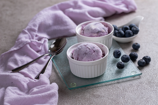 Scoops of ice cream with fresh blueberries