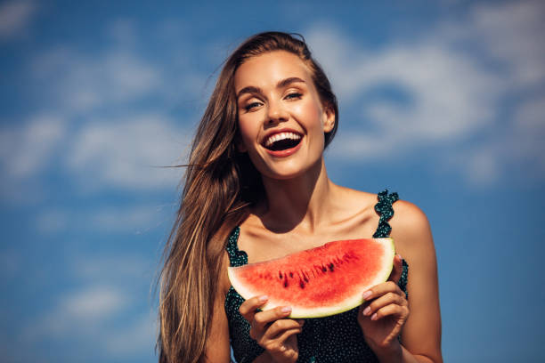 7,300+ Woman Holding Melons Stock Photos, Pictures & Royalty-Free ...
