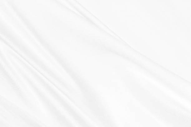 istock fashion textile white Clean woven beautiful soft fabric abstract smooth curve shape decorative background 1331789072
