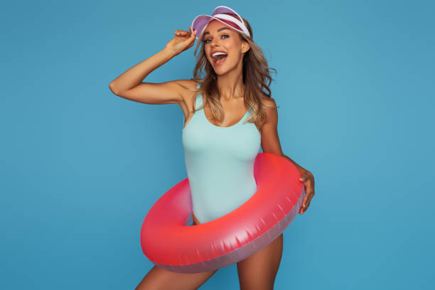 istock Beautiful smiling girl ready for the beach 1331791931