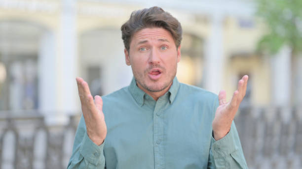 istock Outdoor Middle Aged Man Feeling Shocked, Surprised 1331795434