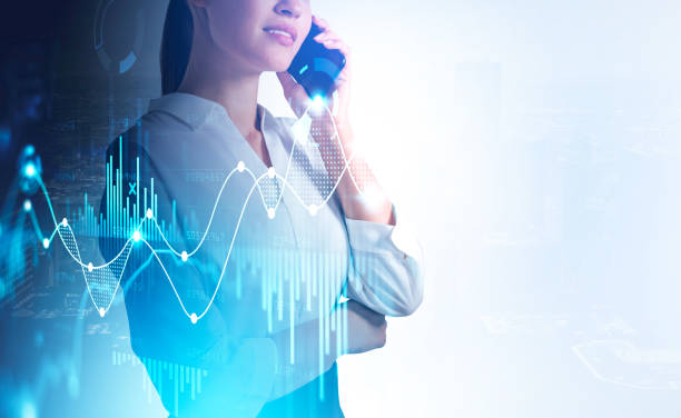 istock Attractive businesswoman pensive using phone calling, data and stock market changes, graph chart. Double exposure of rising graphs. Concept of financial advisor and online trading 1331799033