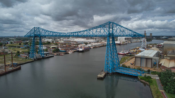 istock Middlesborough transporter bridge crossing River Tees, Middlesborough, North Yorkshire, England, Britain 1331800905