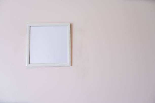 istock blank white square mockup frame on house wall on the right 1331800965