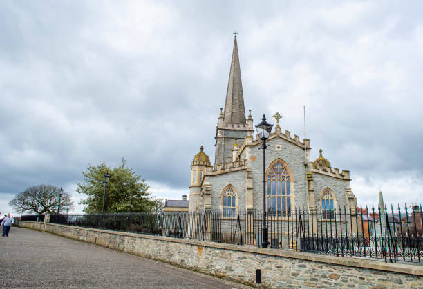 Derry city St. Columb's Cathedral  in a cloudy day stock photo