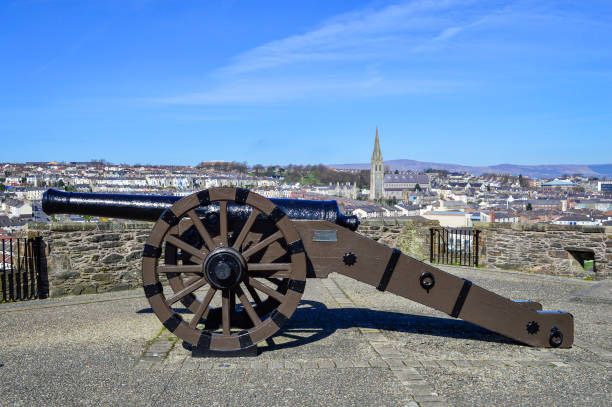 The restored cannons placed on the Derry City Wall stock photo