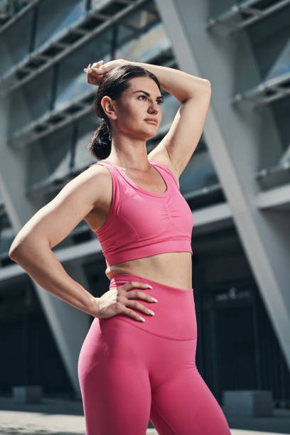 istock Woman propping hand to side with arm on her head 1331806782